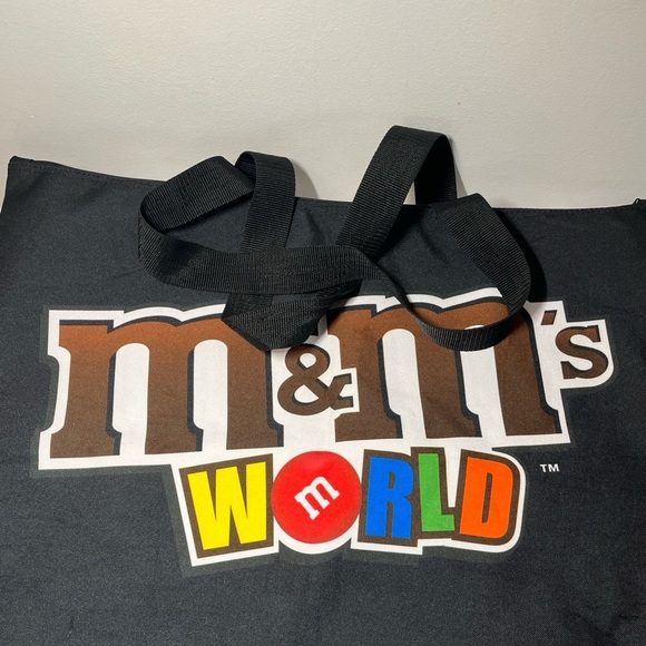 M&M's World graphic tote bag featuring several M&M's characters. - Picture 3 of 9